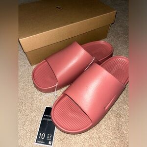 Nike Calm Slides, Womens Size 10 (they could fit a 9 too), Brand new, Never worn